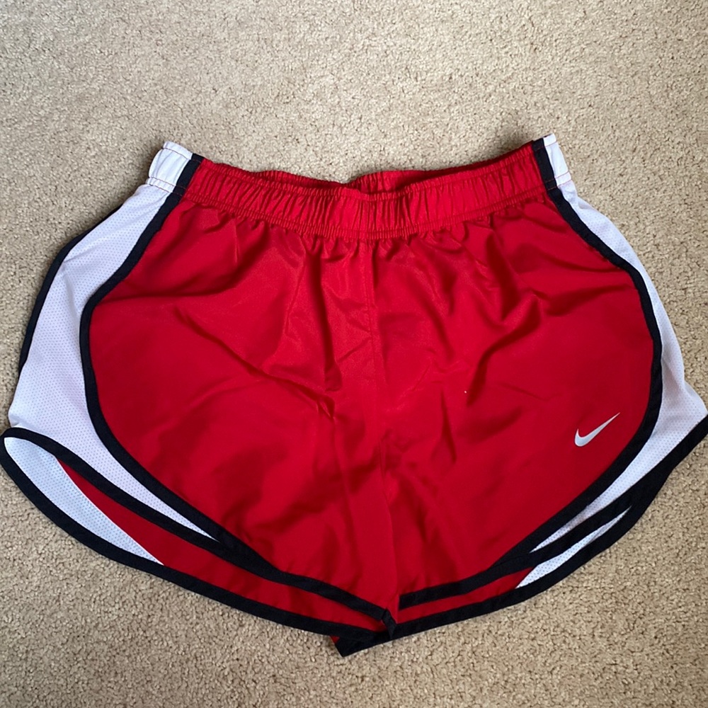 Red Nike running shorts